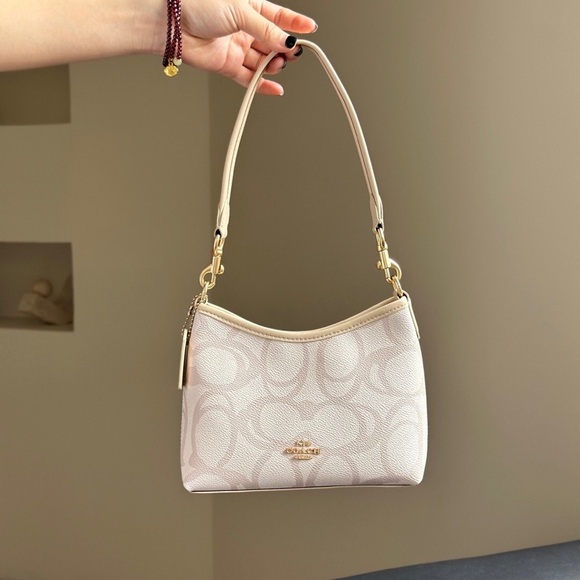Coach Handbags - Coach Cream Shoulder Bag